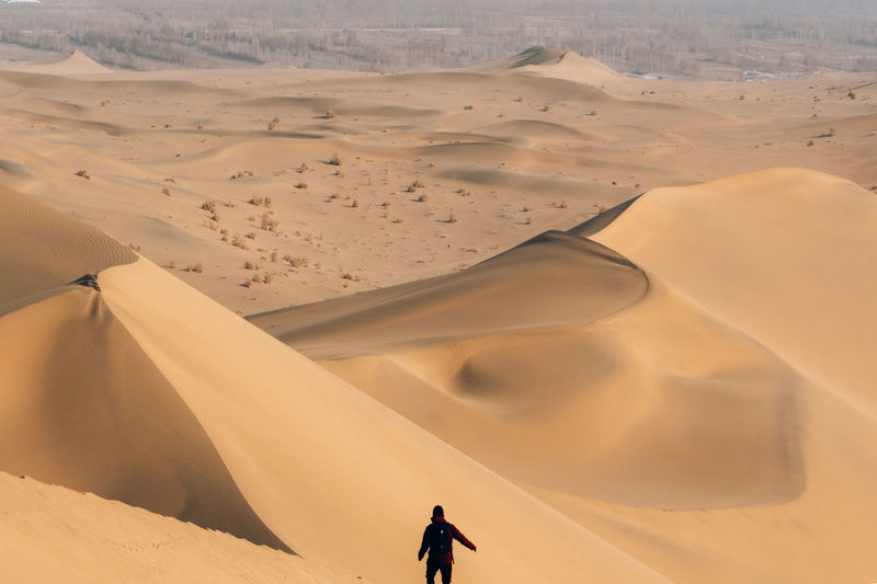 Man standing on desert 