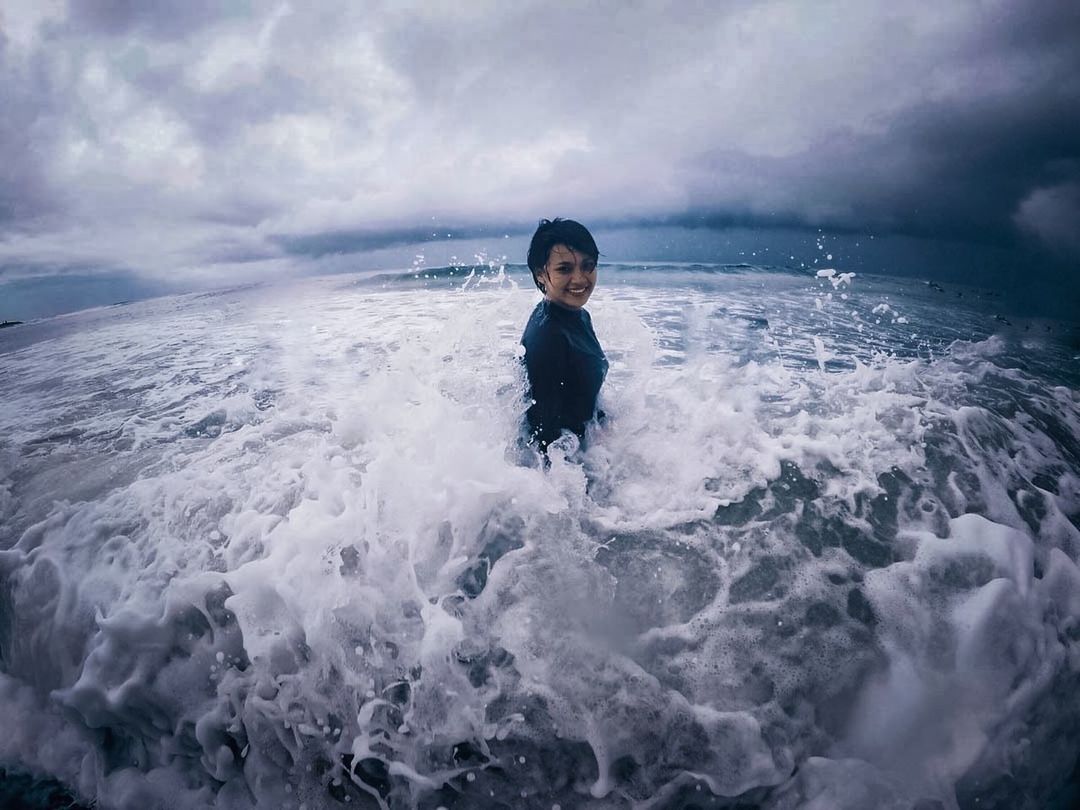 PORTRAIT OF BOY STANDING IN SEA