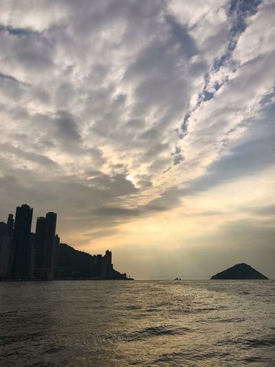 Scenic view of sea against sky at sunset