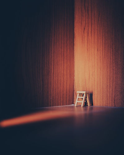 Close-up of empty chair on table at home