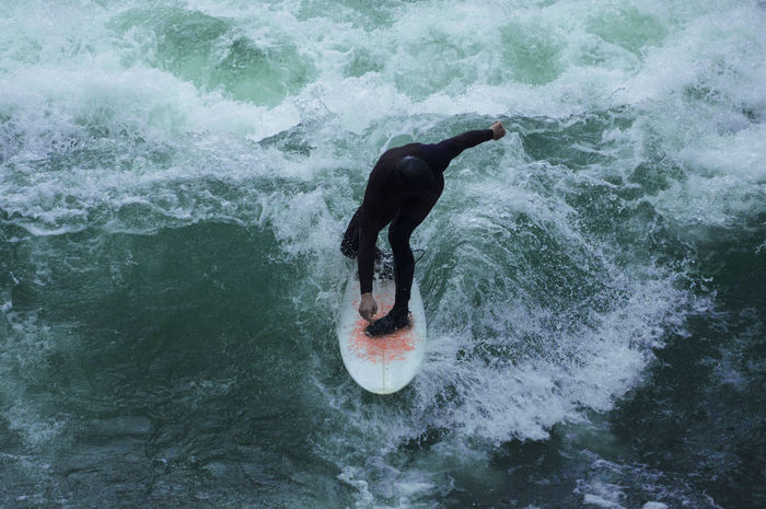 High angle view of man surfing in sea