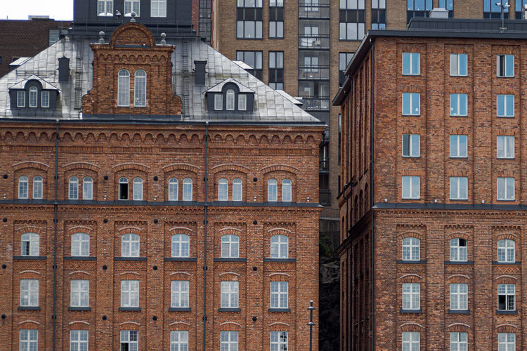 Architecture at kvarnholmen in nacka, where old factory buildings are transformed into apartments.