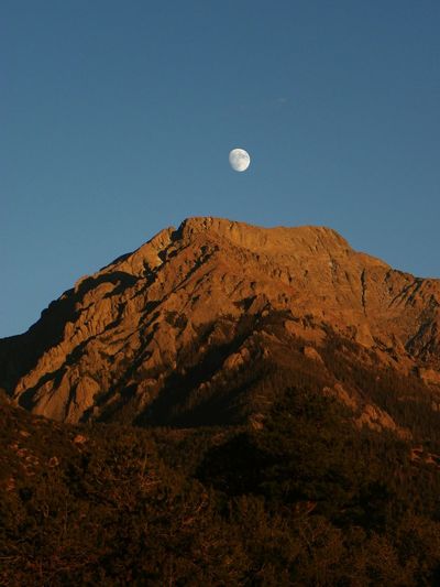 Low angle view of mountain against clear sky