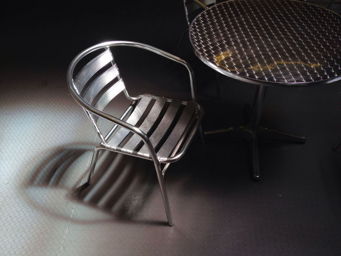 Metallic chair and table in cafe