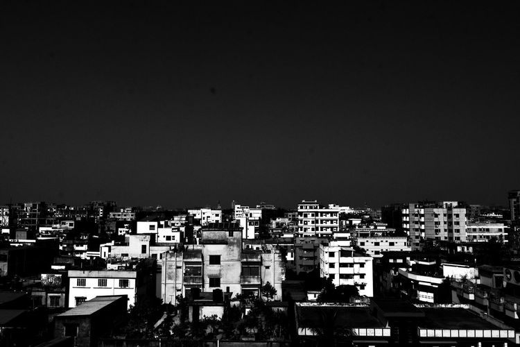 Cityscape against clear sky