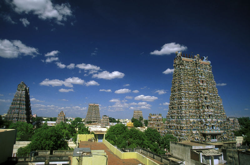 Meenakshi amman temple with cityscape against sky