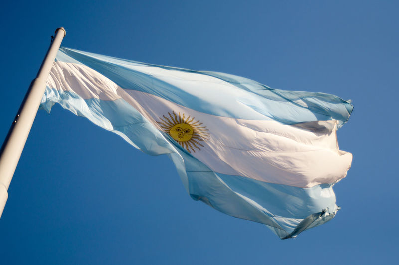 Argentinian flag waving on a sunny day against the blue sky en buenos aires argentina