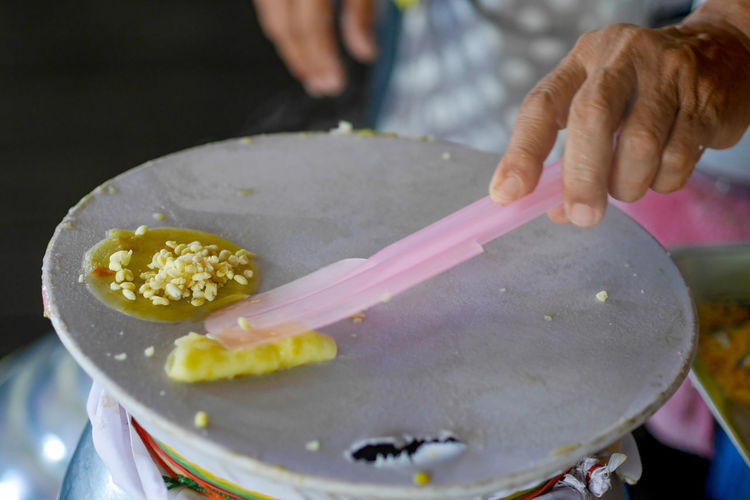 Midsection of chef preparing food