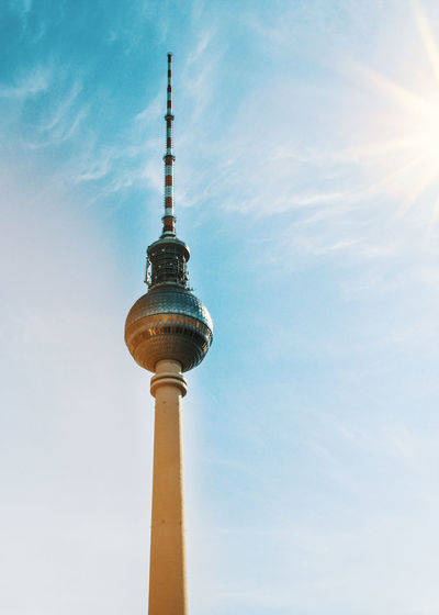 Low angle view of fernsehturm against sky