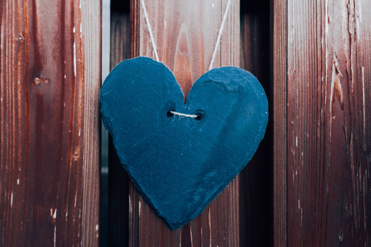 Close-up of heart shape on wooden door