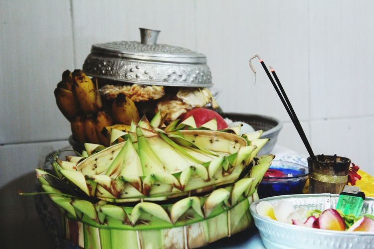 Close-up of fruits in jar on table