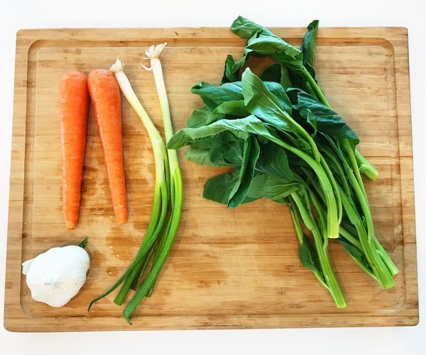 Close-up of vegetables on wood