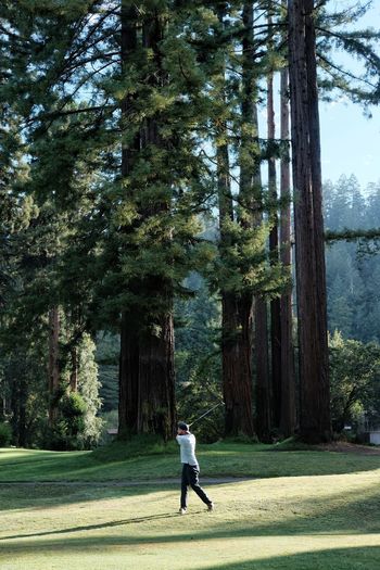 Full length of man walking on golf course