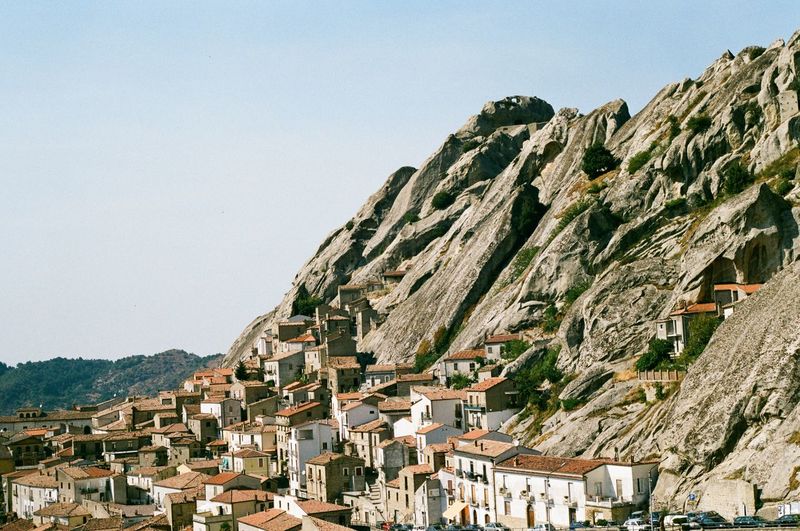 Panoramic view of houses against clear sky