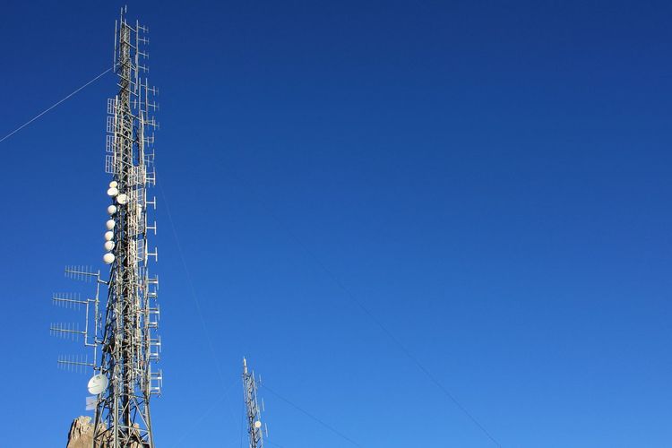 Communication, telecommunication and television antennas, positioned between the rocks 