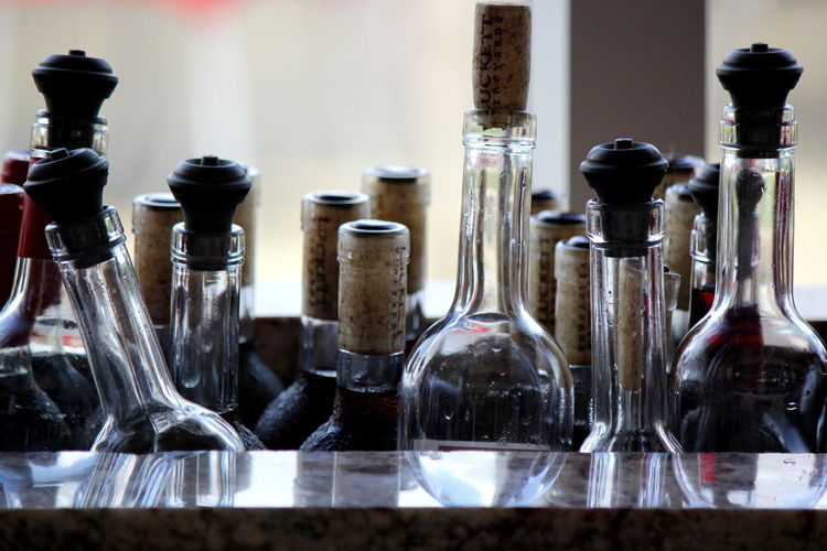 Glass bottles against window