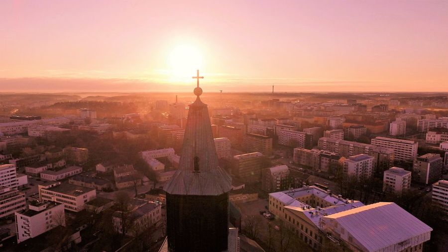 Cathedral of turku in city against sky during sunset