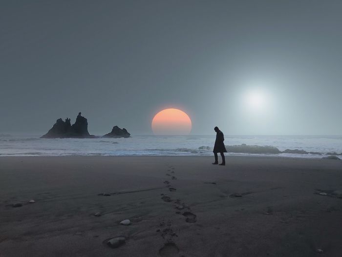 Silhouette of man on beach