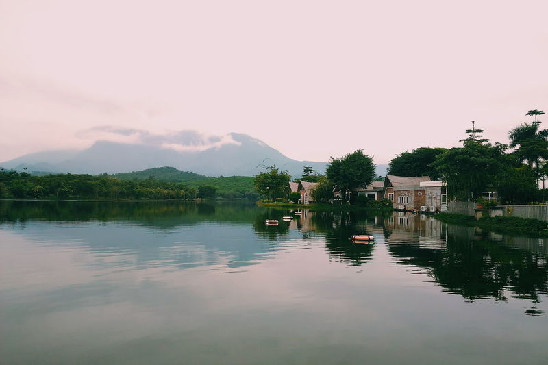 Scenic view of lake with mountains in background