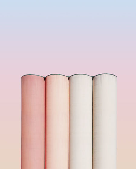 Smoke stack against colored background