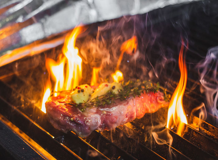 Close-up of steak on barbecue grill