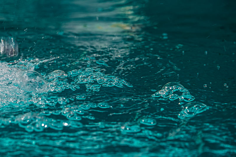 Close-up of water splashing in swimming pool