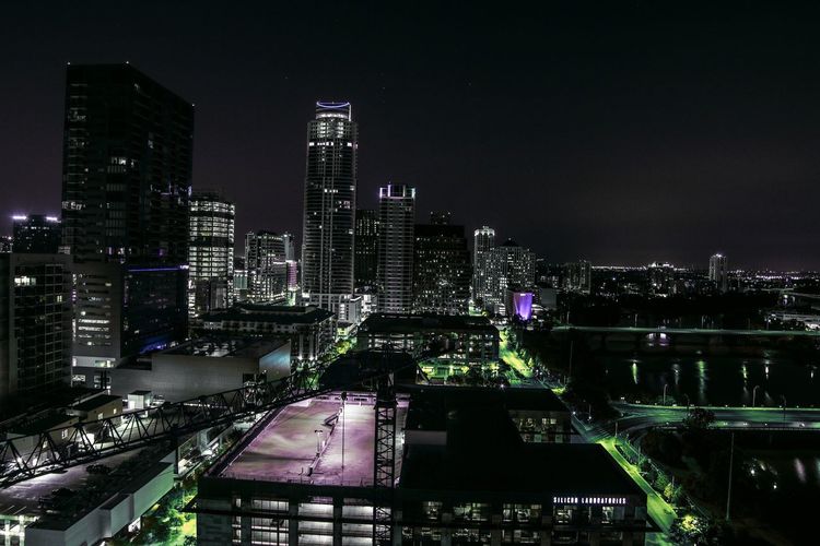 Illuminated cityscape at night