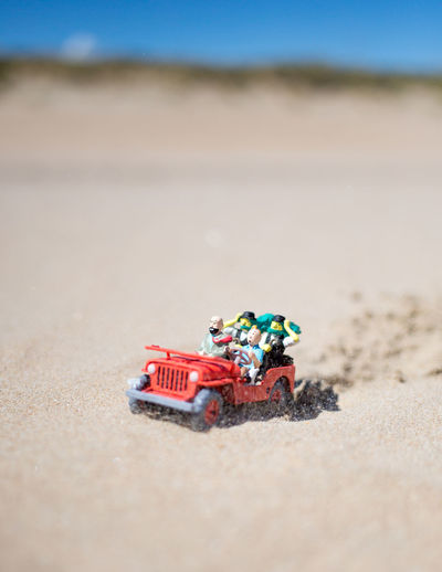 Toy car on beach