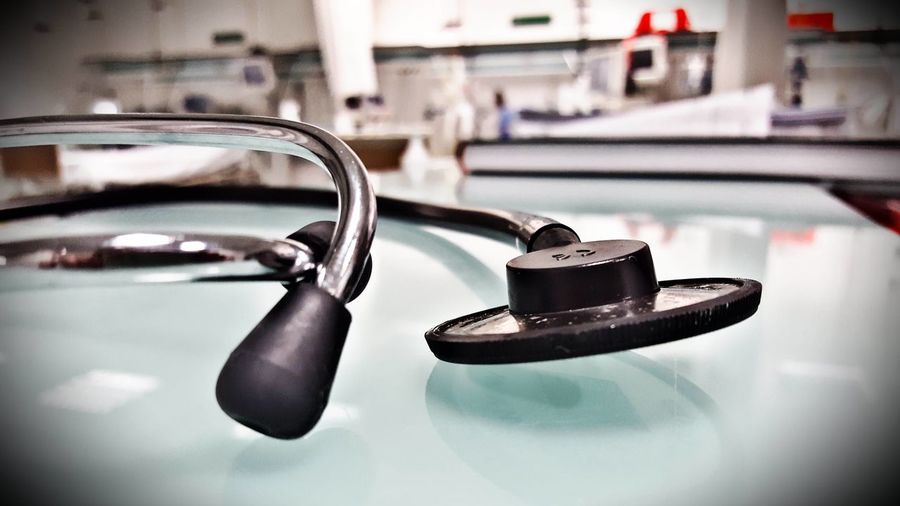 Close-up of stethoscope on table in clinic