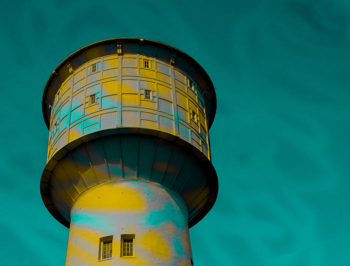 Low angle view of water tower against sky