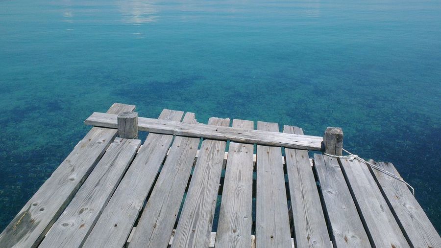 Wooden pier against sea