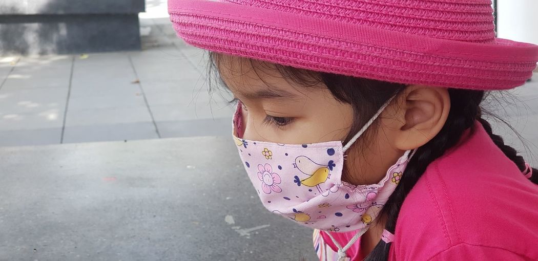 Close-up of girl wearing mask