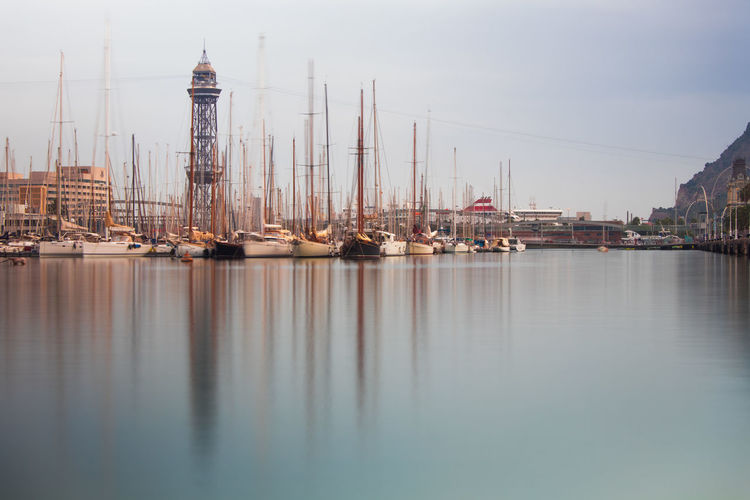 Boats in sea against sky