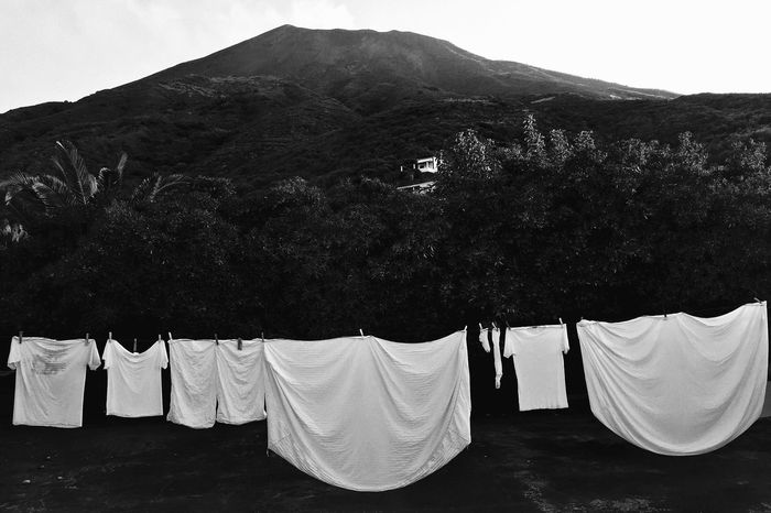 Laundry hanging against mountains