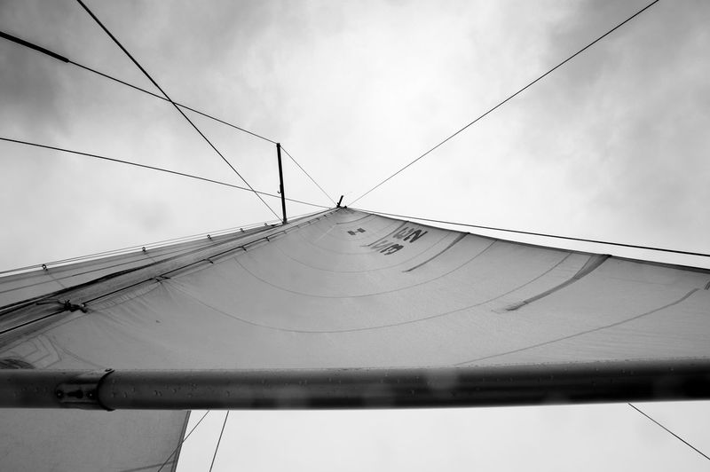 Low angle view of cables against sky