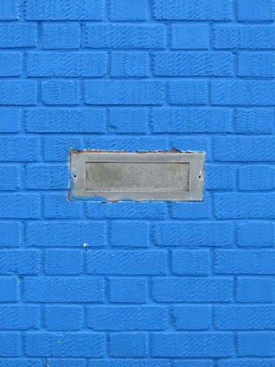 Close-up of blue brick wall