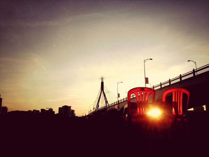 View of built structures at sunset