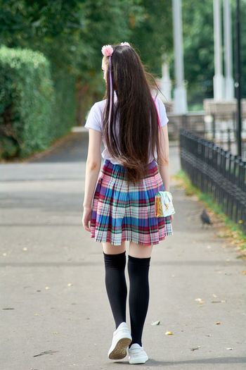 Asian high school girl on a walk.