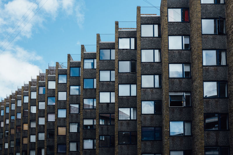 Low angle view of modern building against sky
