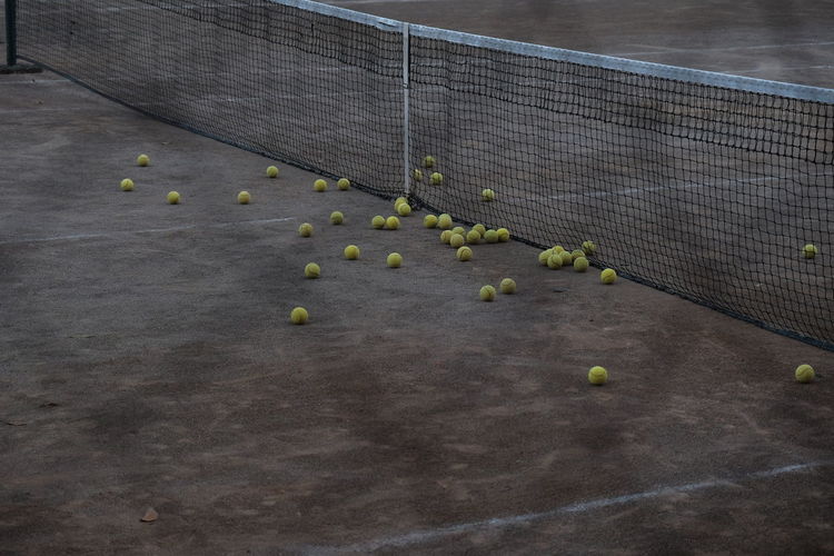 High angle view of tennis balls on court