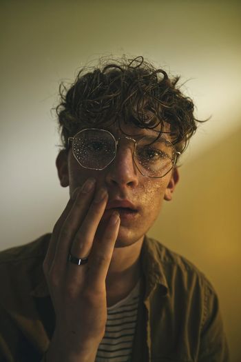 Portrait of man wearing eyeglasses