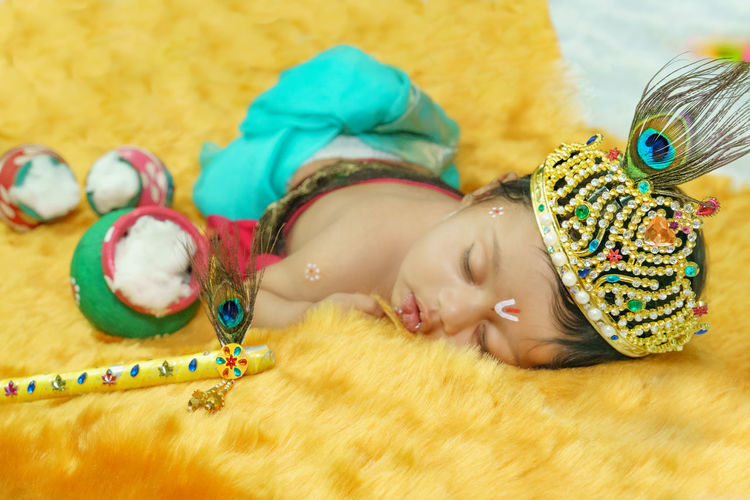 Close-up of woman sleeping with toy
