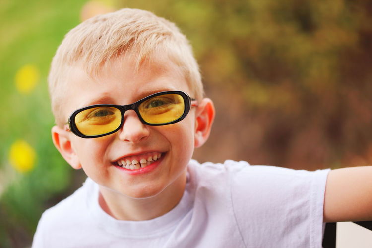 Portrait of smiling boy wearing sunglass