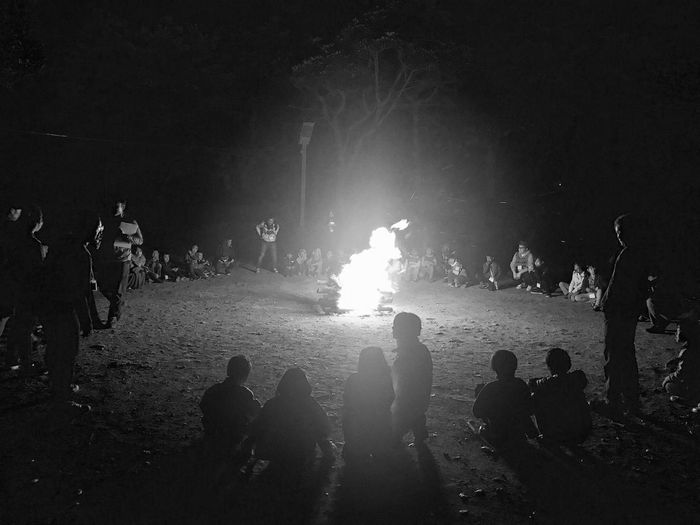 Group of people in the dark