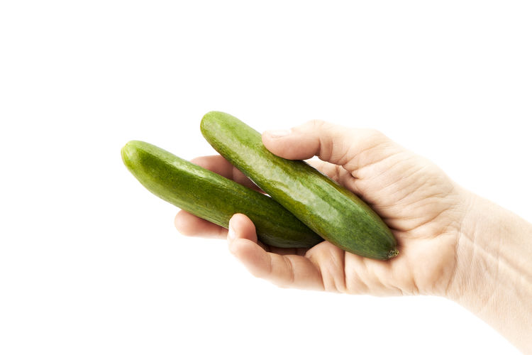 Close-up of cucumber against white background