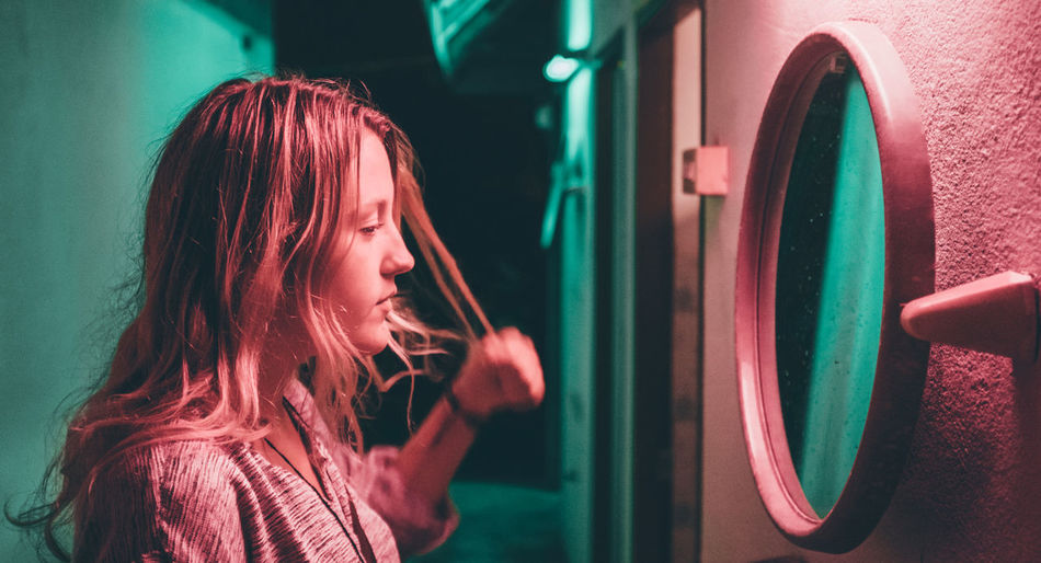 Millennial Pink Portraits Portrait Photography Portrait Mood Atmospheric Mood Atmosphere EyeEm Night Portrait Of A Woman Portraiture Woman Girl Female Mirror Dreamy Dreamy Reality Nightphotography Atmospheric One Person Moody Pink Turquoise Night Photography The Portraitist - 2018 EyeEm Awards