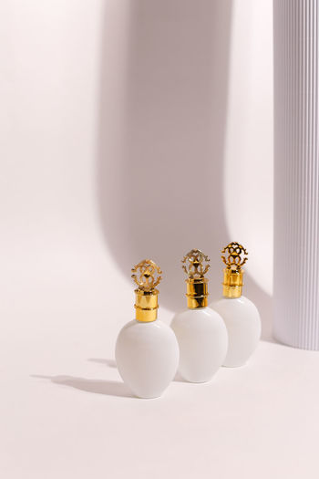 Close-up of chess pieces on white background