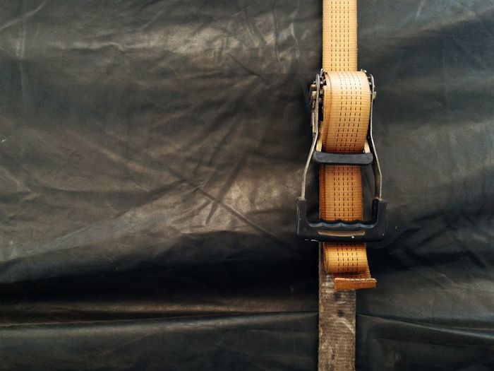 High angle view of belt on plastic