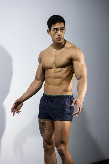 Close-up of shirtless muscular man