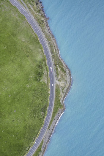 High angle view of road by sea 